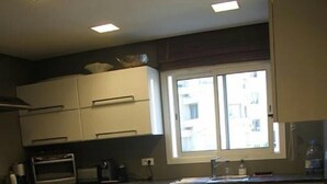 Apartment | Private kitchen | Coffee/tea maker, fridge, microwave, oven - Appartement tres haut standing (Rabat)