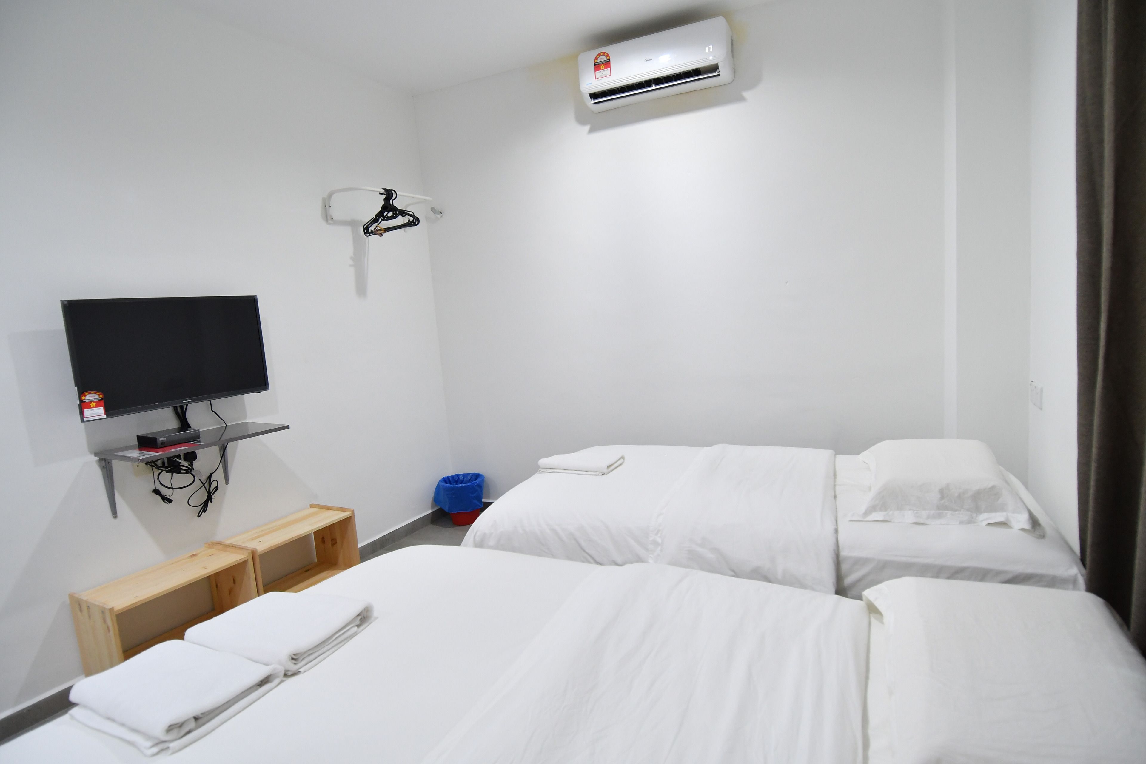 deluxe triple room, multiple beds | premium bedding, desk, iron/ironing board, free wifi
