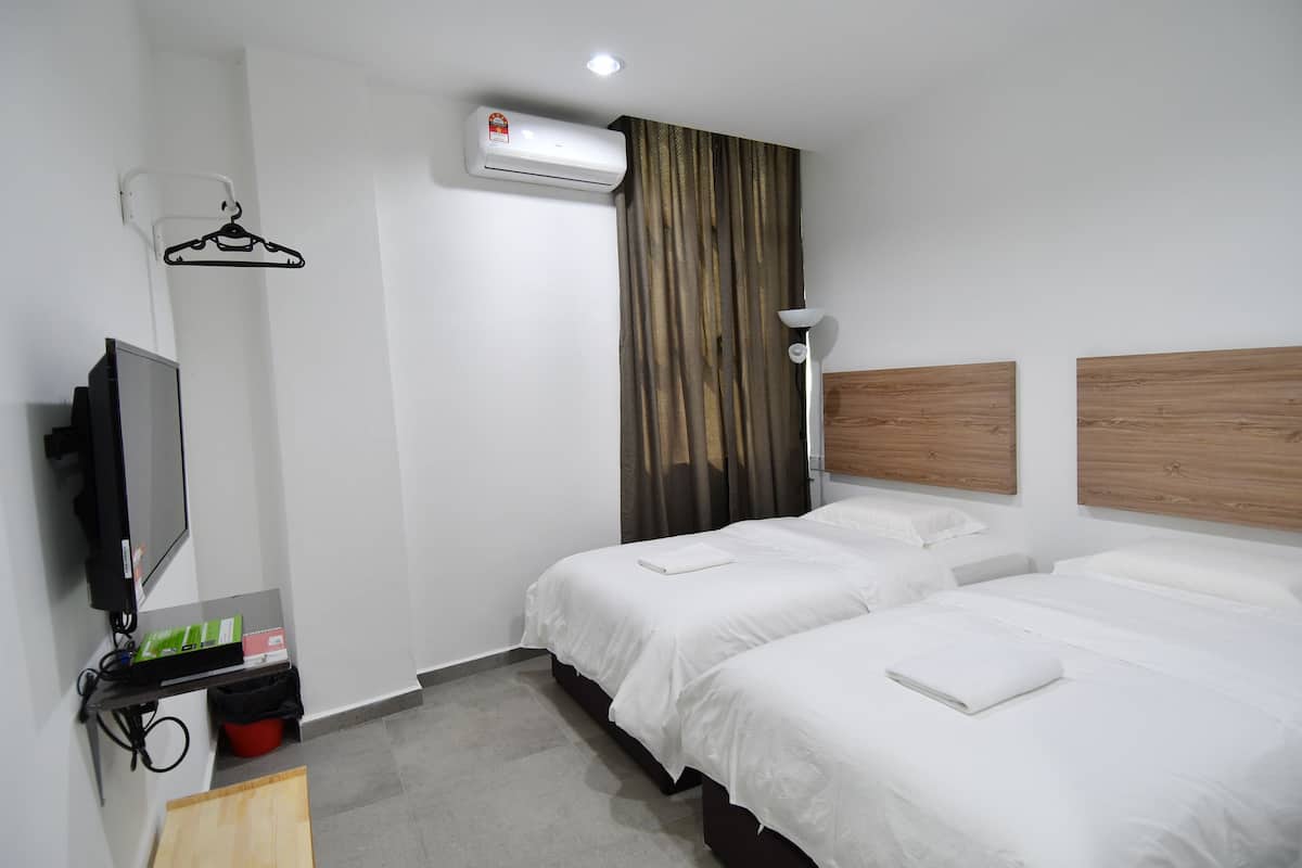deluxe twin room, 2 bedrooms, mountain view | premium bedding, desk, iron/ironing board, free wifi