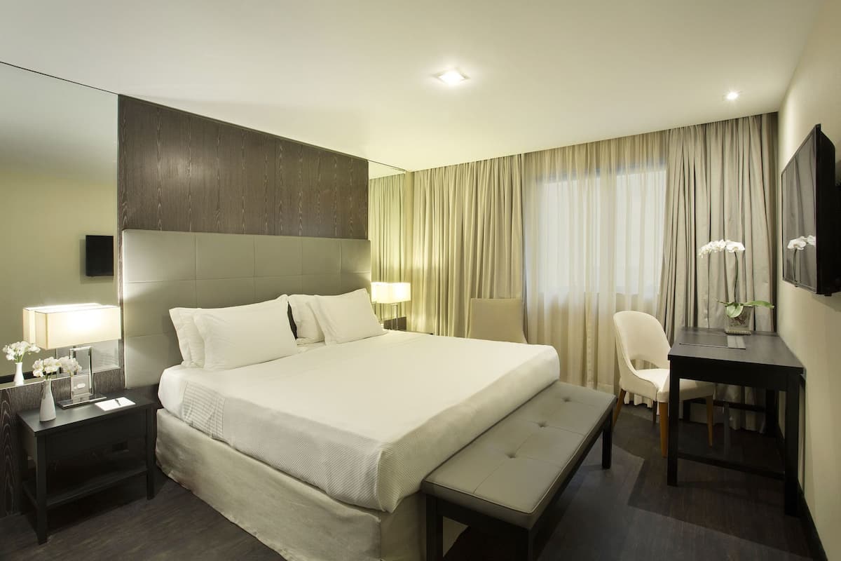 Ropa de cama de alta calidad y minibar