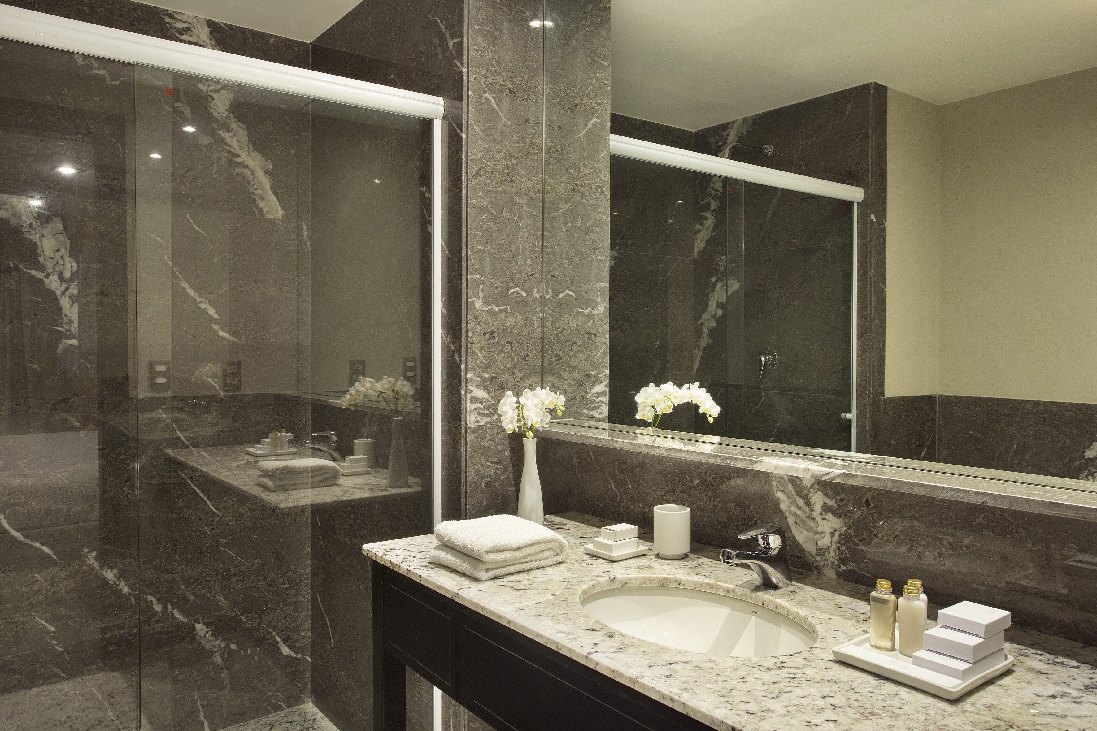 shower, free toiletries, hair dryer, towels