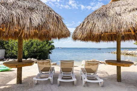 Private beach, sun loungers, beach towels, kayaking. Dolphin Point Villas