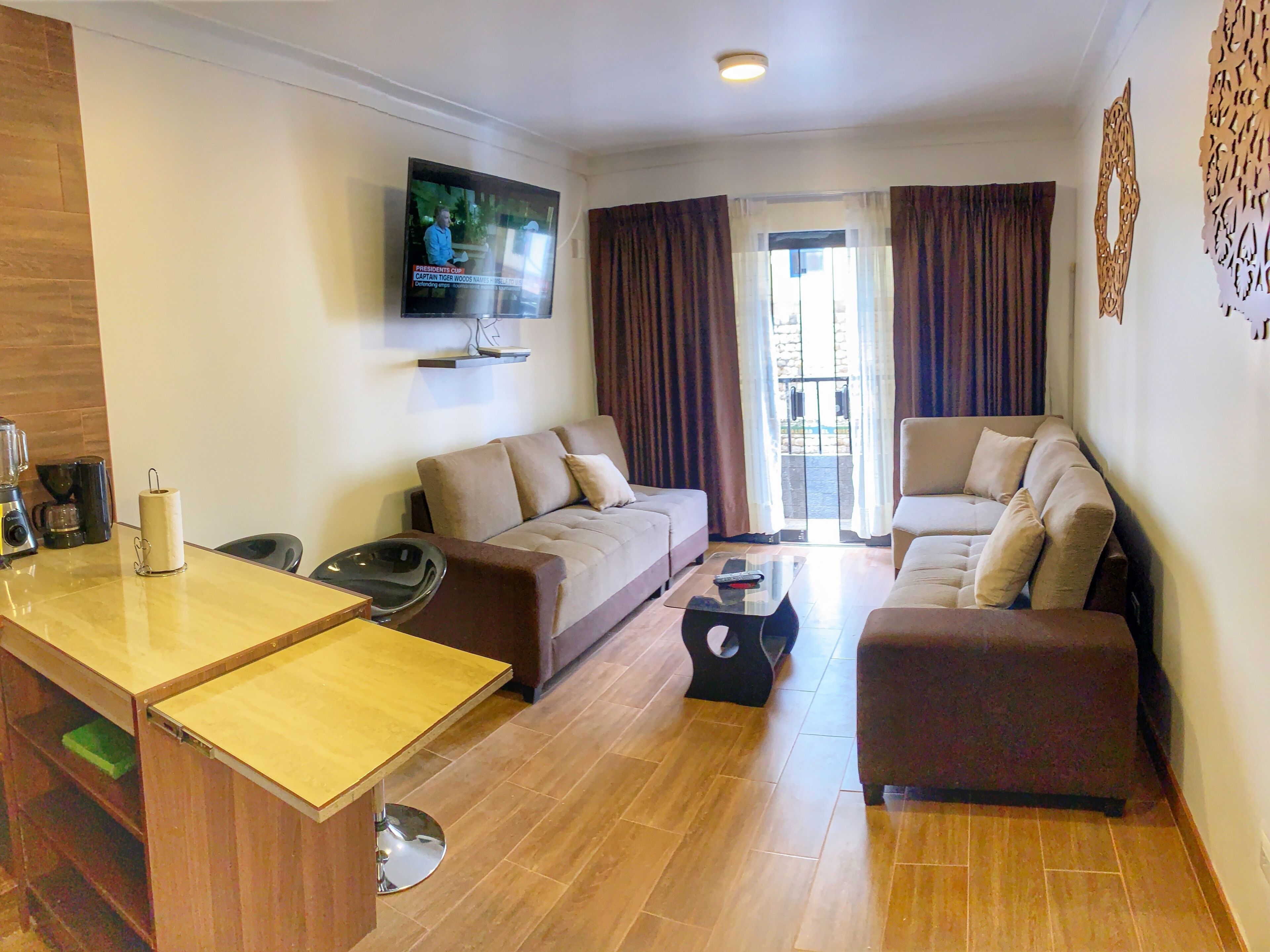 Family Apartment, 2 Bedrooms, City View, Tower | Living area | 45-inch flat-screen TV with cable channels, TV