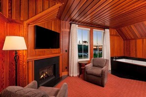 Habitación estándar, 1 cama de matrimonio grande | Zona de estar | Una televisión de pantalla plana, Netflix, Hulu, servicios de streaming