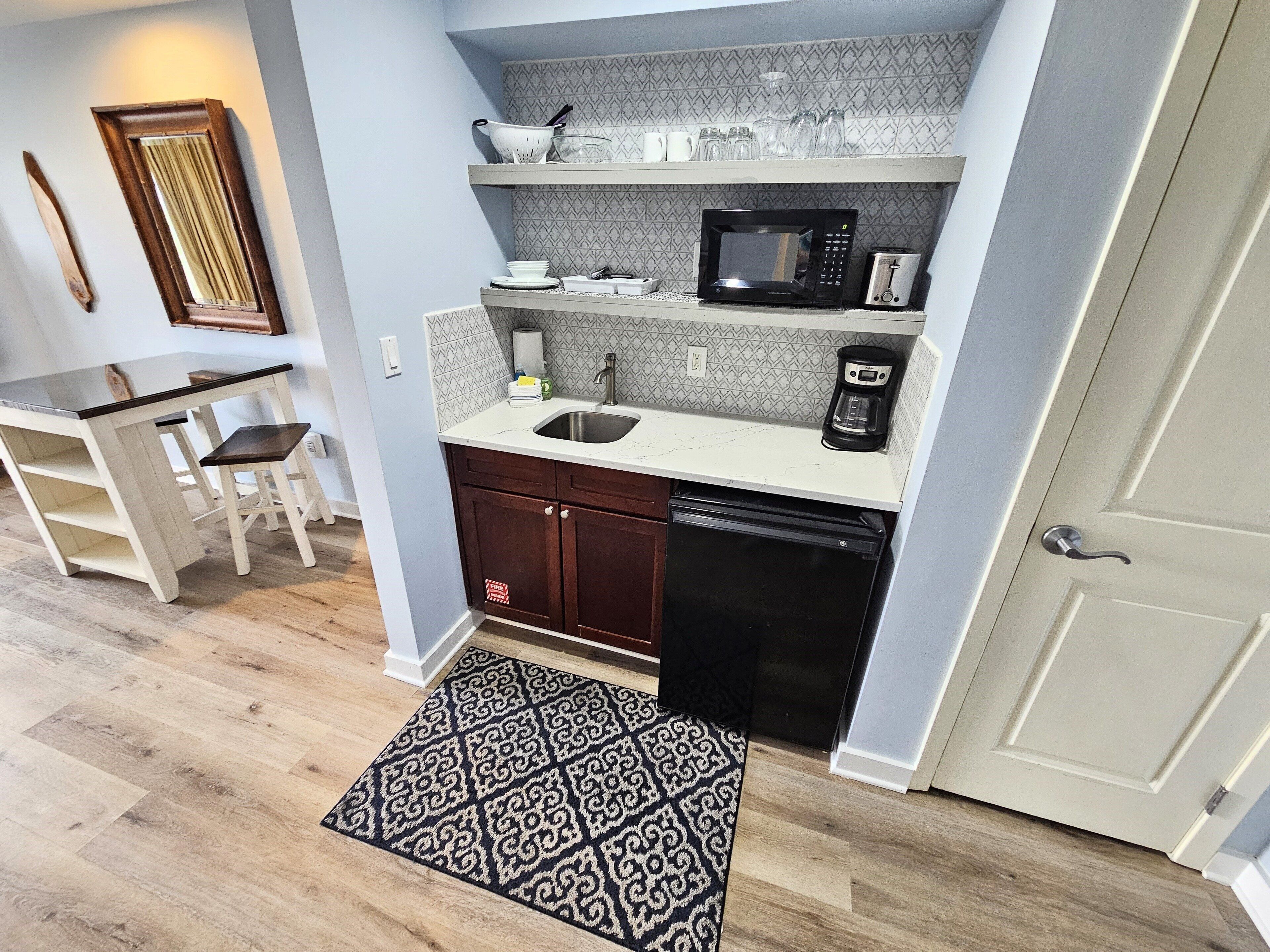 Coffee/tea maker, fridge, microwave, toaster