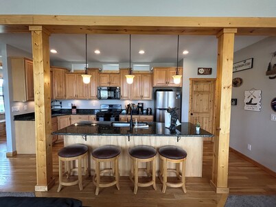 Your home away from home with private hot tub, game room, and majestic views