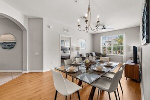 Elegant Dining Delight: Dine in style in our elegantly appointed dining room, where every meal becomes a memorable experience - Premium 3BR condo Resort Perks near Epic Universe (Orlando)