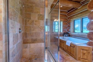 Combined shower/bathtub, hair dryer, towels, soap
