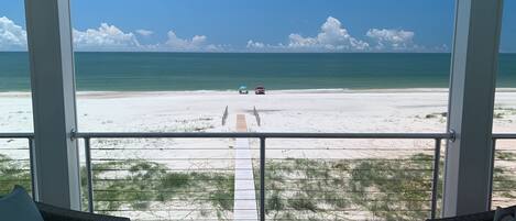 On the beach, sun loungers, beach towels