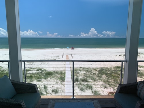 Gulf Front Beach House with open concept and elevator and 220 ft boardwalk.