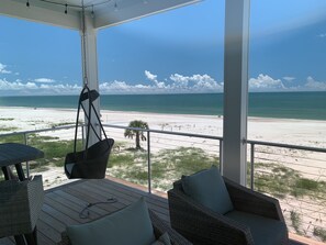 On the beach, sun loungers, beach towels