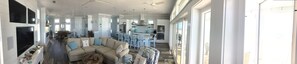 Flat-screen TV, books - Gulf Front Beach House with open concept and elevator and 220 ft boardwalk. (Port St Joe)