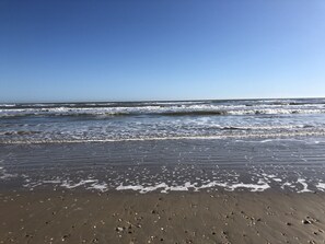 On the beach, sun loungers