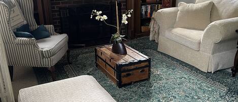 Smart TV, fireplace, books