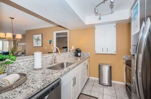 Fridge, microwave, oven, stovetop - A12- Villas of Clearwater Beach, Gulf-front condo (Clearwater Beach)