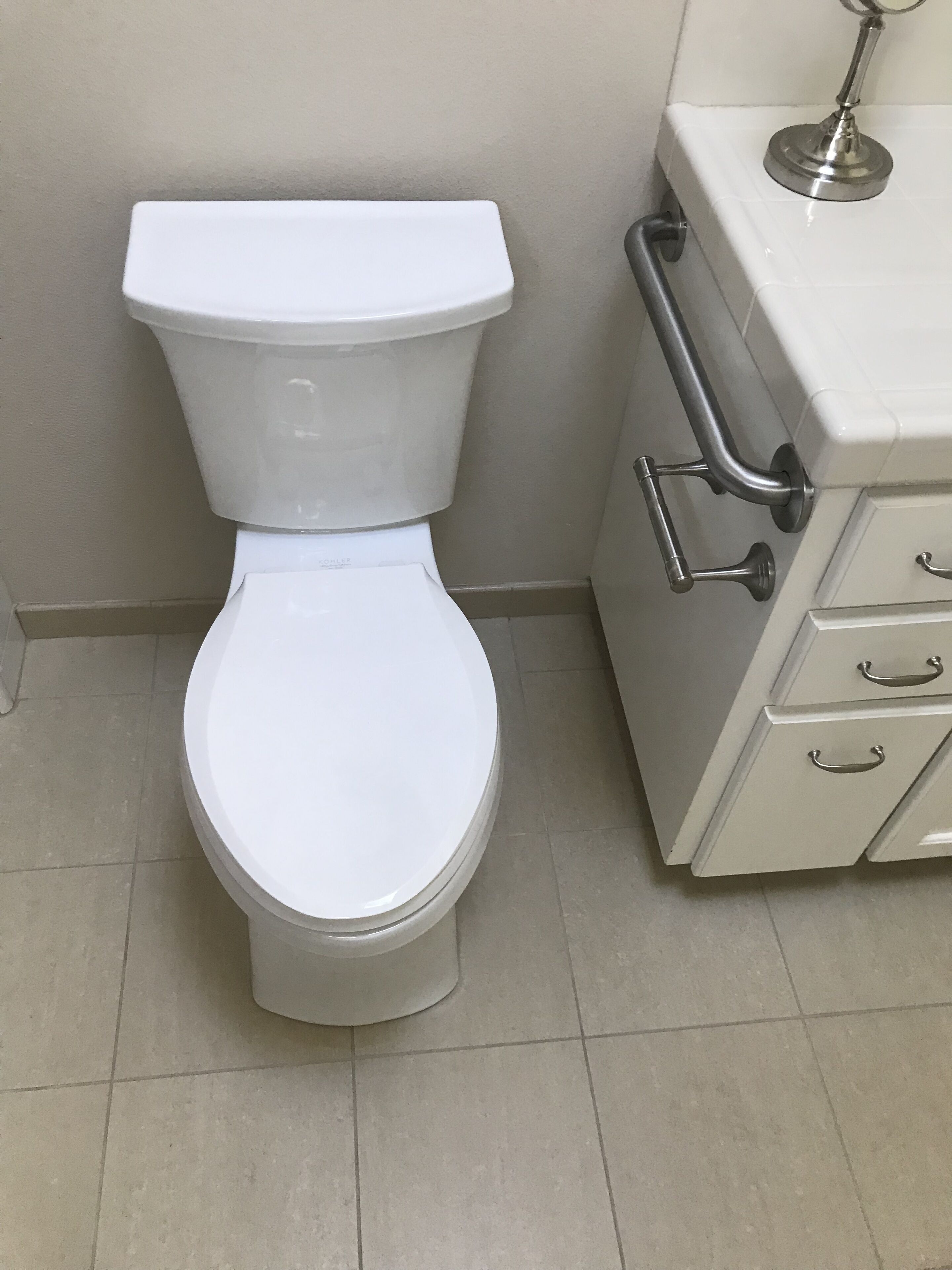 Bathroom is stocked with 4 sets of quality  towels, care products, ADA toilet