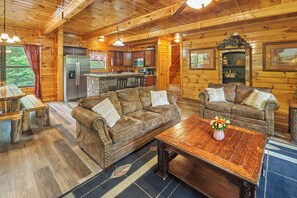 Een televisie, een open haard, een dvd-speler en een stereo