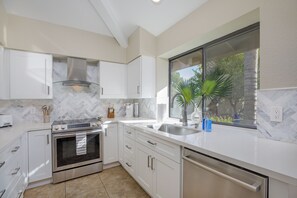 Fridge, microwave, oven, stovetop - Located in the Heart of Scottsdale with a heated pool, game room, and fire pit! (Scottsdale)