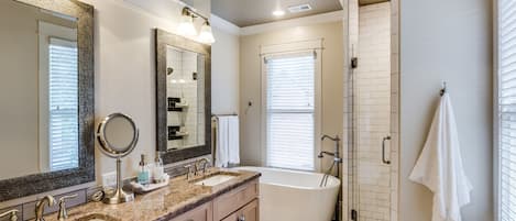 Bathtub, hair dryer, towels, soap