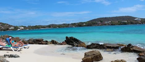On the beach, sun loungers, beach towels
