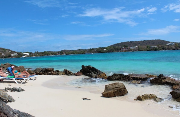 On the beach, sun loungers, beach towels