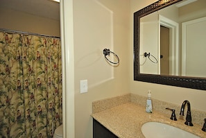 Bathtub, hair dryer, towels