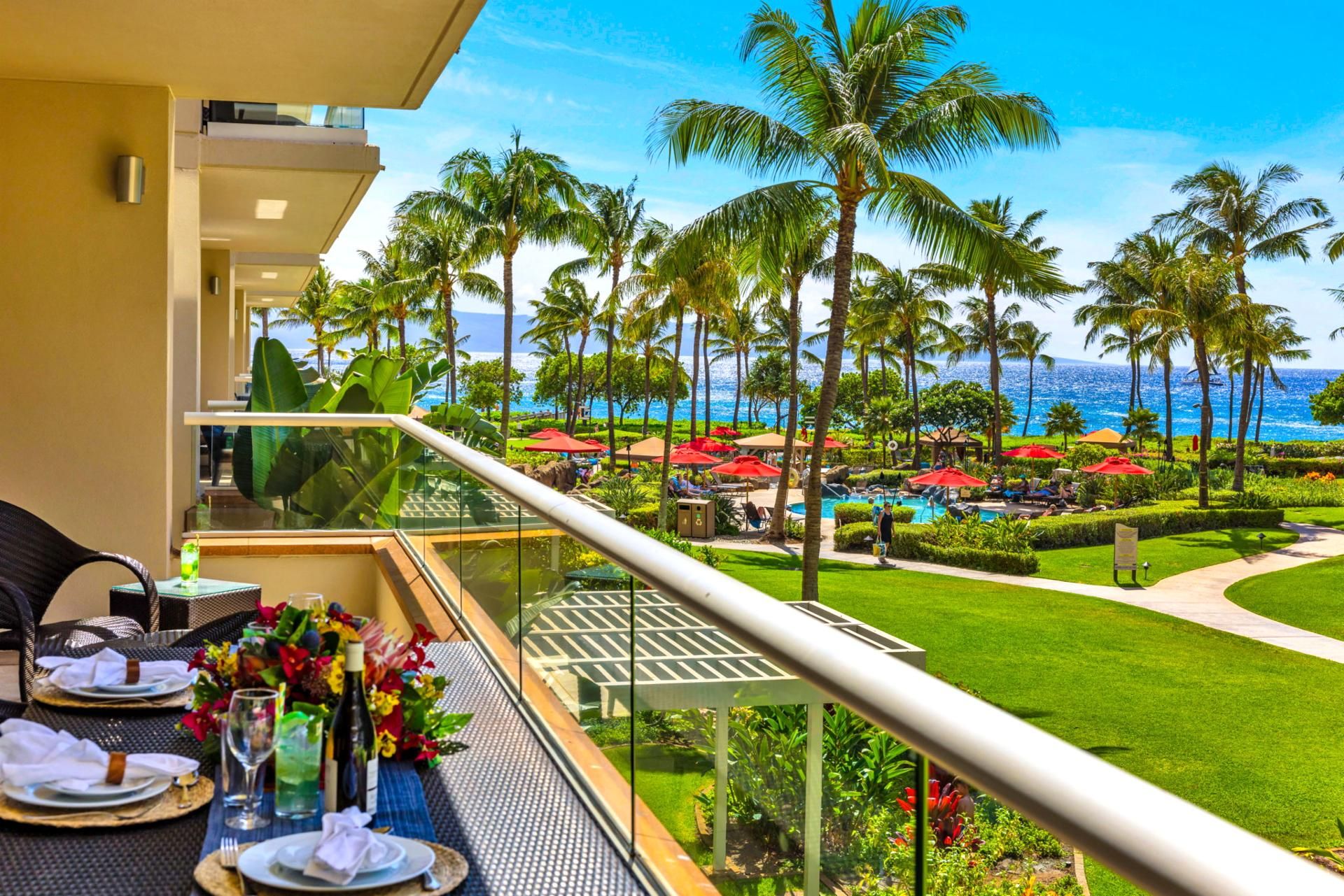 Dine alfresco on the lanai with lush landscaping and ocean glimpses, a nightly Maui ritual