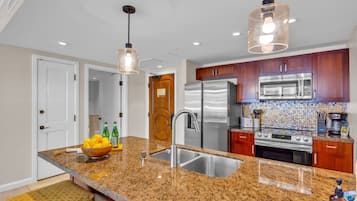 Coffee/tea maker, fridge, microwave, oven