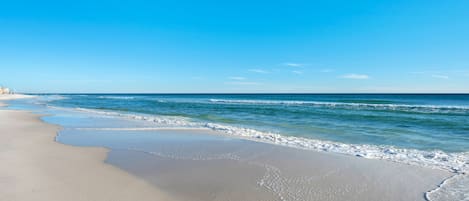 On the beach, sun-loungers