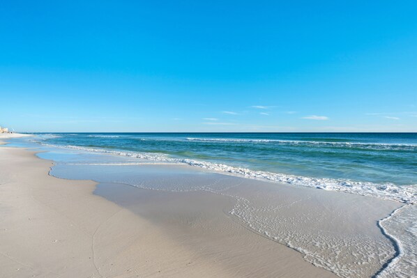 On the beach, sun-loungers