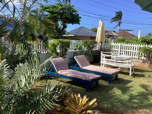 Property grounds - COTTAGE BY THE SEA - steps from Beach -chef included -    THE YELLOW CANARY  (Duncans Bay)