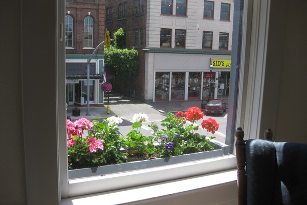 Window boxes along the front of the building (369 Court NE).