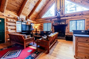 Flat-screen TV, fireplace, video-game console, DVD player