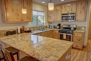 Modern appliances and granite countertops for your cooking pleasure