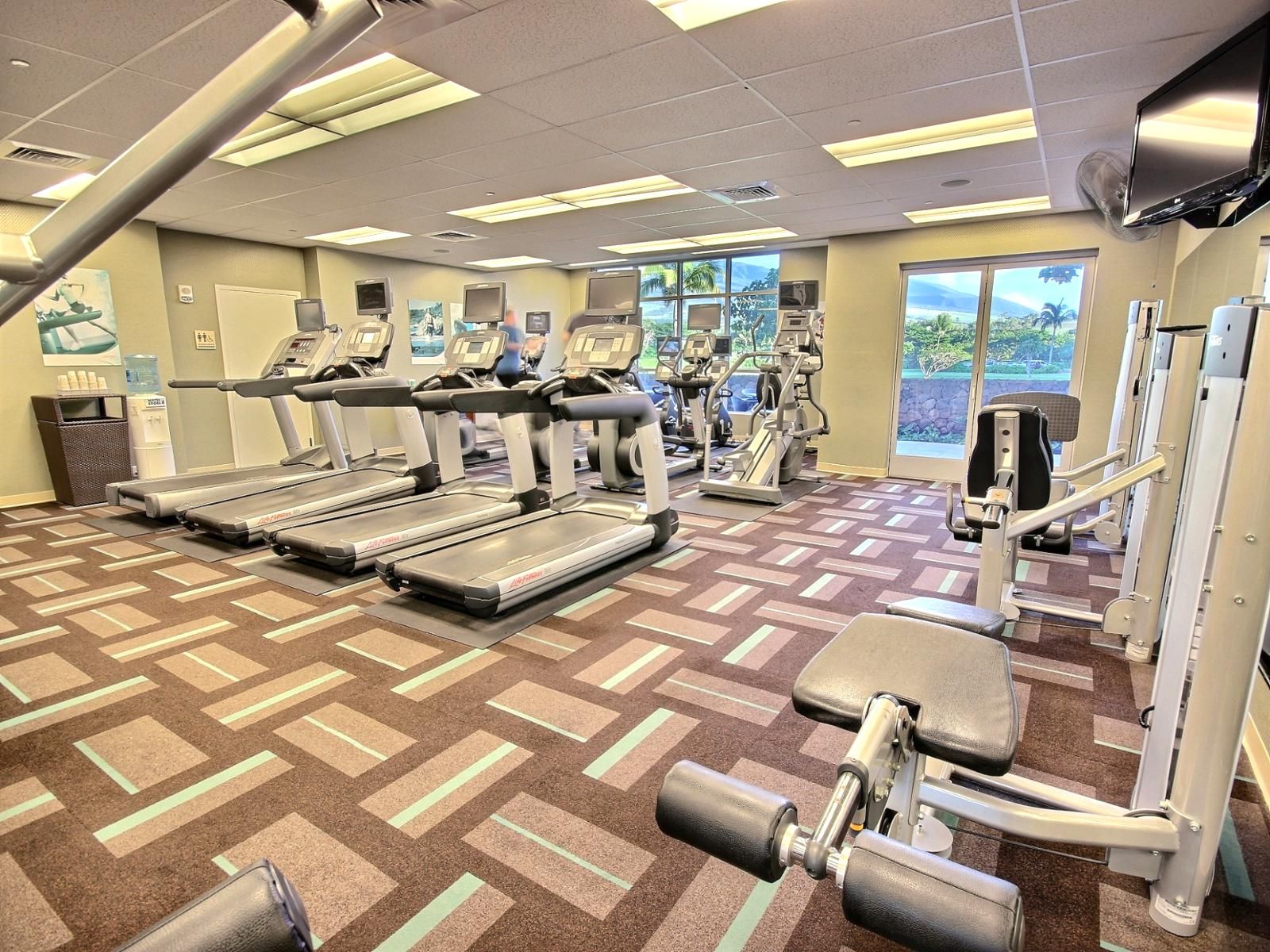On-site fitness center with cardio machines, strength training, and scenic views to keep you inspired