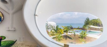 Stunning lagoon-front villa with pool, private hot tub, & AC