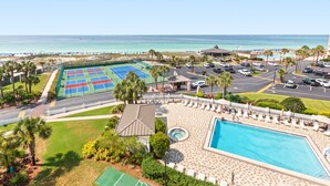 A resort with a tennis court, swimming pool, and beach view. - 🌊 Views That Go On Forever (Destin)