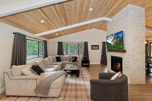 Flat-screen TV, fireplace, DVD player, ping pong