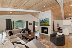 Flat-screen TV, fireplace, DVD player, ping pong