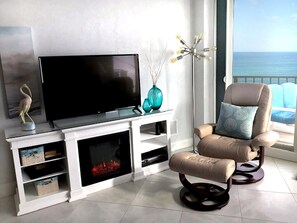 Smart TV, fireplace, DVD player, books