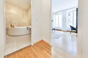 Bathtub, hair dryer, towels