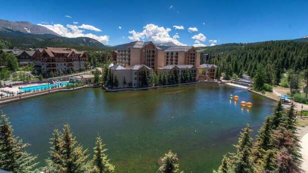 A large hotel with multiple buildings, a central courtyard, and a swimming pool. - Luxury Ski-In Penthouse- Walk to Main St (Breckenridge)