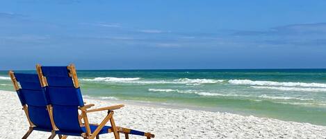 On the beach, sun loungers