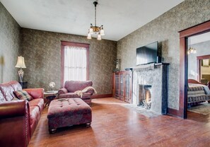 Smart TV, fireplace, books