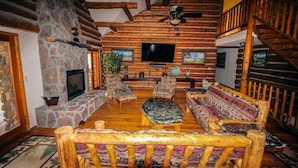 TV, fireplace, books - RS Lodge - 9 Bedrooms managed by Cabin Butler (Greer)