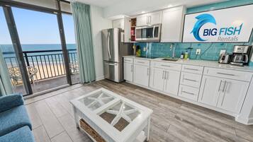 Fridge, microwave, stovetop, coffee/tea maker