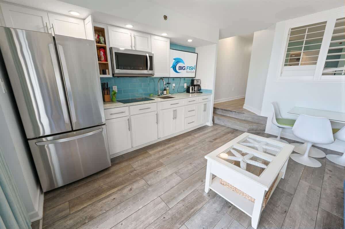 Fridge, microwave, stovetop, coffee/tea maker