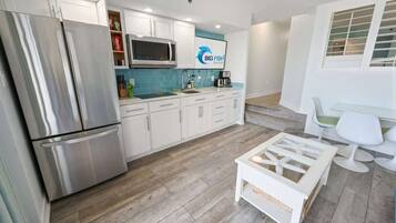 Fridge, microwave, stovetop, coffee/tea maker