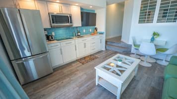 Fridge, microwave, stovetop, coffee/tea maker
