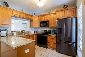 Fridge, microwave, oven, stovetop - Perfectly Positioned: Banana Bay Resort's Home Close to Everything You Need! (Pensacola)